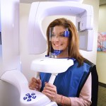 Smiling patient in x ray unit